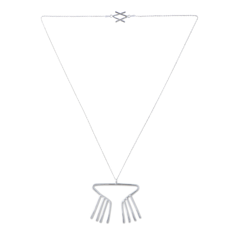 Sky Phaebl's sterling silver necklace. Open triangular pendant with fixed fringe and slight hammer texture. On delicate chain with signature V clasp. 