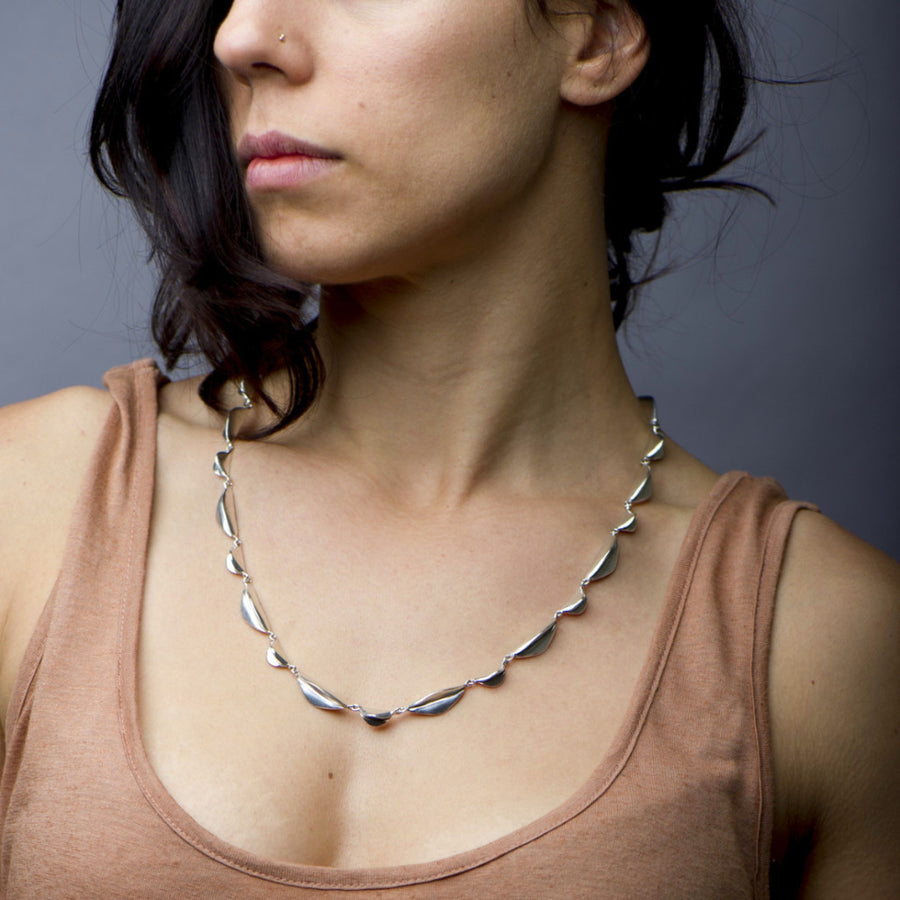 Handmade, sculptural sterling silver chain linked necklace. Designed and crafted by Sky Phaebl