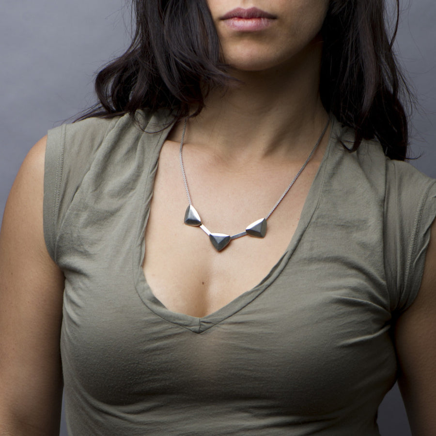 Handmade luxury. Sky Phaebl sterling silver sculptural statement necklace. Organic and refined. 